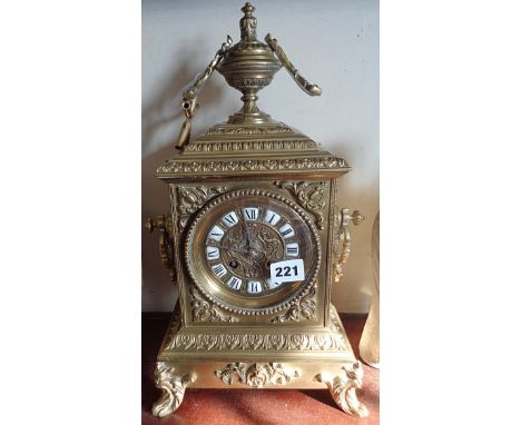 19th c. French ormolu mantle clock having brass dial with enamel numerals