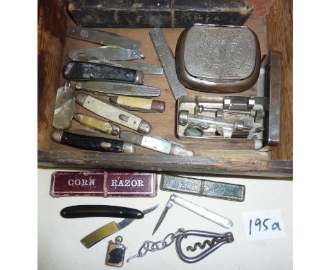 Collection of penknives and pocket knives, miniature lighter, cut throat razors, syringe in case, etc.