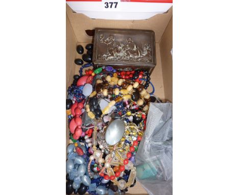 Vintage beaded jewellery, and an antique copper box decorated with cherubs