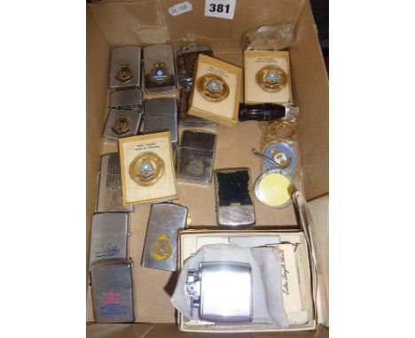 Collection of lighters some mounted with enamel crest of HMS Cavalier, similar enamel badges in boxes for HMS Phoebe, a Ronso