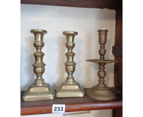 Pair Victorian brass candlesticks and a similar brass candlestick with drip pan
