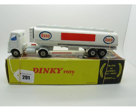 A Boxed Original Dinky #945 Fuel Tanker 'Esso', white cab/chassis, light blue interior, light grey plastic hubs, 'Tiger in yo