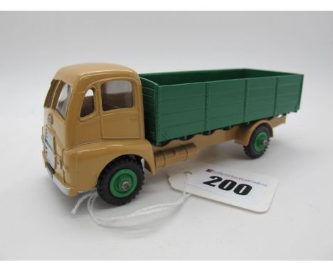 An Original Dinky #431 Guy Warrior Four Ton Lorry, light tan cab with glazing, dark green back, mid green  hubs, spare wheel.