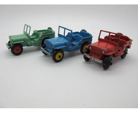 Three Original Dinky 25J Jeeps, possibly U.S. Market colourways. Mint green body, red hubs, light blue body, yellow hubs and 