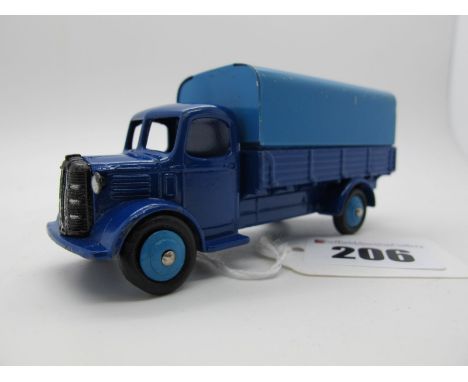 An Original Dinky #3OS Austin Covered Wagon, dark blue body, light blue tilt and hubs, black radiator, silver details. Some c