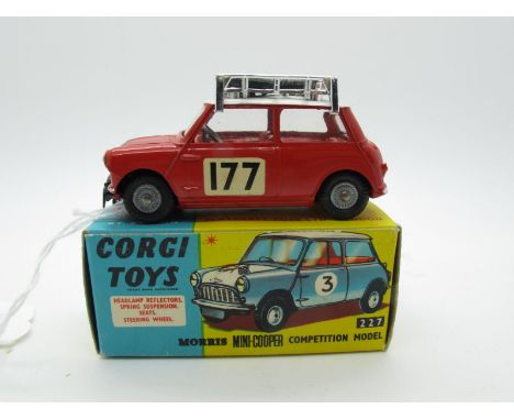 A Boxed Original Corgi #339 Mini Copper 'S' 'Monte Carlo 1967', red body, white roof R.N.177, two spare wheels on chromed roo