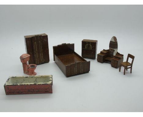 A Quantity of Pre-War Dinky 'Dolly Varden' Furniture, all bedroom and bathroom related including Wardrobe/Dresser/Bed. Signs 