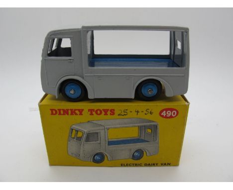 A Boxed Original Dinky #490 Electric Dairy Van 'Express Dairy', light grey body, blue chassis blue hubs and blue logo. Model 