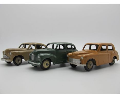 Three Original Dinky Saloon Cars #152 Austin A40 Devon, suede green body, 'Devon' on underside roof, fawn hubs. #40E Standard