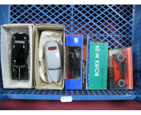 Five Russian Made 1:43rd Diecast and Resin Cars,  cased NAMM 1 U.S.S.R., First Production Car. A boxed Volga M-24 Saloon and 
