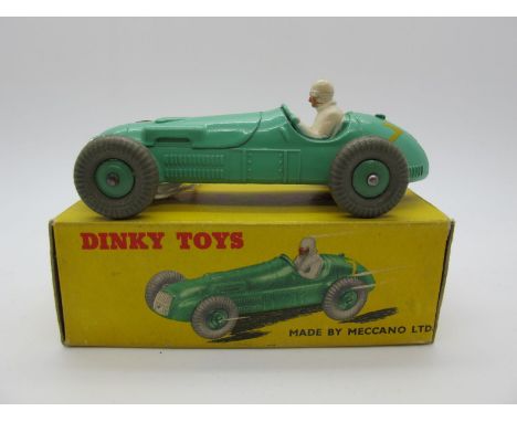 A Boxed Original Dinky #23J H.W.M. Racing Car, green body, green hubs, yellow #7's. Model near mint, tiny box rub on drivers 