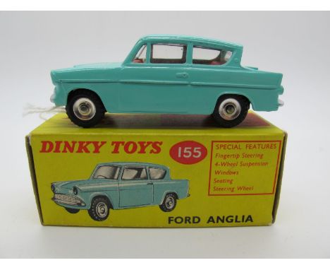 A Boxed Original Dinky #155 Ford Anglia 105E, turquoise body, red interior, spun hubs. Model is mint. Box very good.