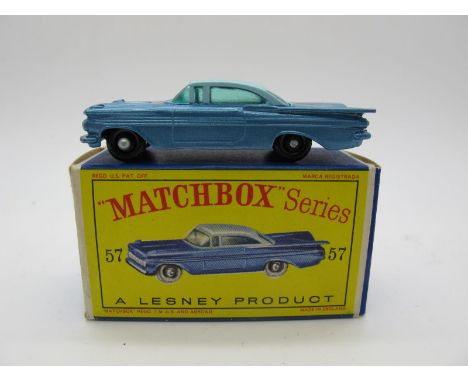 Matchbox 1:75 No. 57 Chevrolet Impala, metallic blue body/light blue roof/black plastic wheels/black base/tinted glazing. Exc