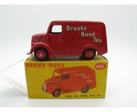 A Boxed Original Dinky #455 Trojan Van 'Brooke Bone Tea', dark red body, red hubs. Model is near mint with slight rubbing on 