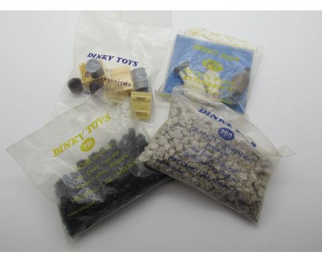 Four Bagged Original Dinky Accessories, #007 Petrol Pump Attendants (opened), #851 Vehicle Loads, #791 Coal and #790 Granite 