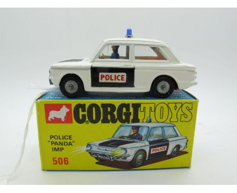 A Boxed Original Corgi #506 Sunbeam Imp 'Panda' Car, white body, black bonnet and doors, brown interior, cast detail hubs, Po