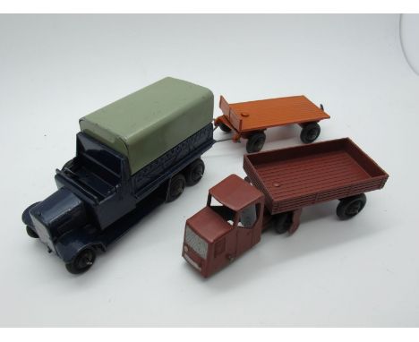 Three Original Dinky Models, '151B six Wheel Covered Wagon, dark blue body, black ridged hubs, grey tin canopy, seat holes, #