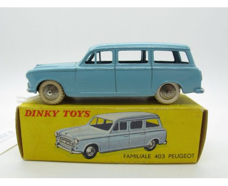 A Boxed Original French Dinky #24F Peugeot 403-U Familliale, sky blue body, plated convex hubs, white tyres, silver details. 