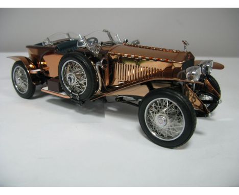 A Boxed Franklin Mint 1:24th Scale Die Cast 1921 Rolls Royce Silver Ghost, specially fitted with a copper covered body. Highl