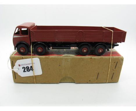 A Boxed Original Dinky #501 Foden Diesel Eight Wheel Wagon, first type chocolate brown cab and body, black , no slits chassis