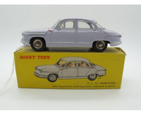 A Boxed Original French Dinky #547 Panhard P.L.17, first type violet body, off white interior, spun hubs, silver details. Mod