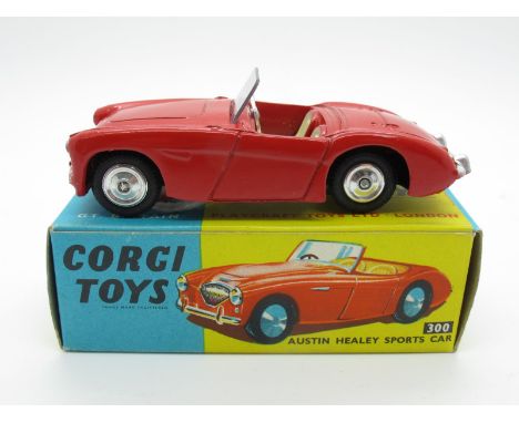 A Boxed Original Corgi #300 Austin Healey 100-4, red body, cream interior, spun hubs, silver detailing. Model is mint, box ex