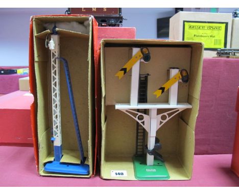 A Pre War Hornby 'O' Gauge No.2 Distant Signal, in original box and a Post War No.2 Junction Signal Away Signal. In original 
