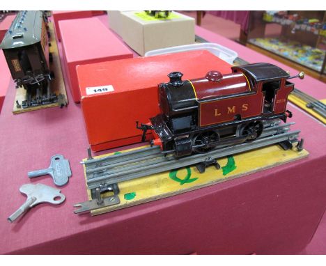 A Post-War Hornby 'O' Gauge No.101 Clockwork Tank Locomotive, finished in LMS maroon. Overall good. Boxed with original paper