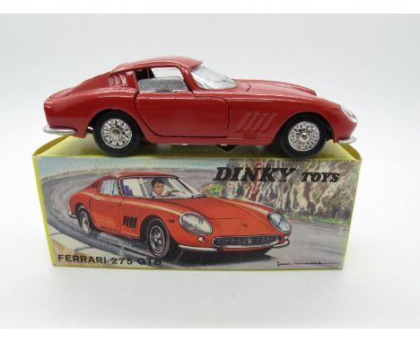 A Boxed Original Dinky #506 Ferrari 275 GTB, red body, black interior, cast detail hubs. Model is near mint - one tiny rub on