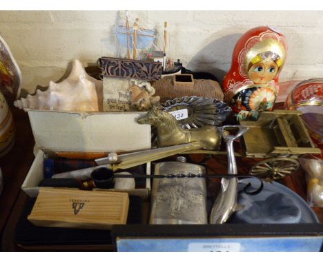 A Tray of Sundries to Include Silver Plated Hip Flask, Dolphin Bottle Opener, Brass Horse and Cart, Russian Doll, Model Trawl