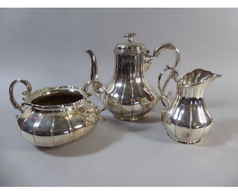 A Good Quality Three Piece Silver Plated Tea Service by Elkington and Co with Ribbed Decoration 