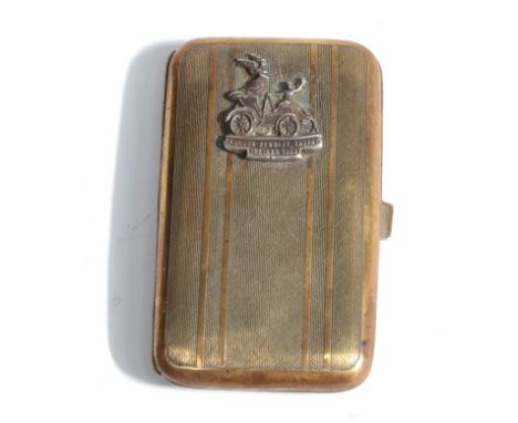 A Brass Cigarette Case, with engine turned decoration and surmounted by a badge engraved Gordon Bennett Trophy Ireland 1903, 