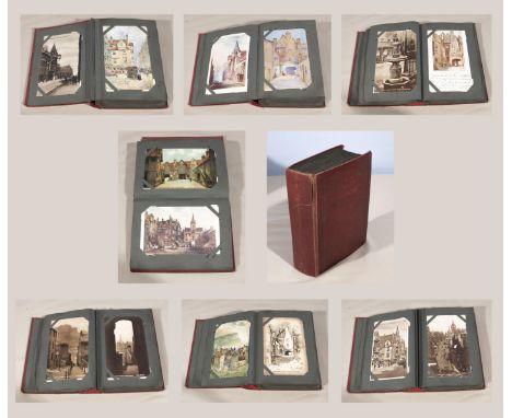 An album containing vintage postcards of Edinburgh scenes