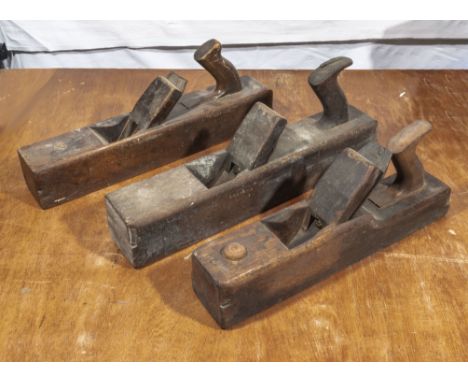 Three vintage wooden planes