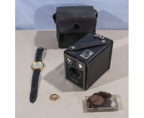 A Kodak Brownie box camera together with a watch, ring and coins