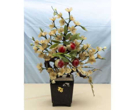 A vintage Chinese Oriental carved glass peach tree 