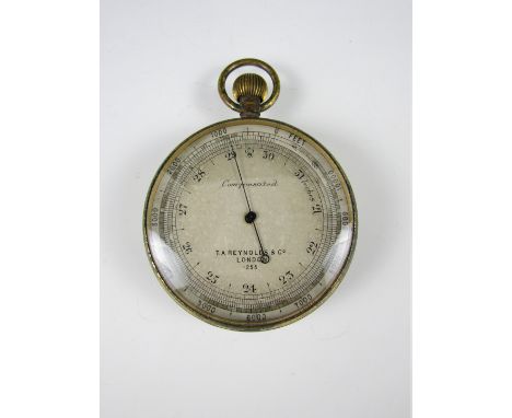 A late 19th / early 20th Century pocket aneroid barometer by T A Reynolds & Co, London, serial 255, case 7.2 cm diameter