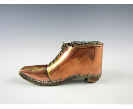 A 19th century copper and wood snuff box modelled as a boot and bearing insignia of a French 51st Regiment with grenade devic