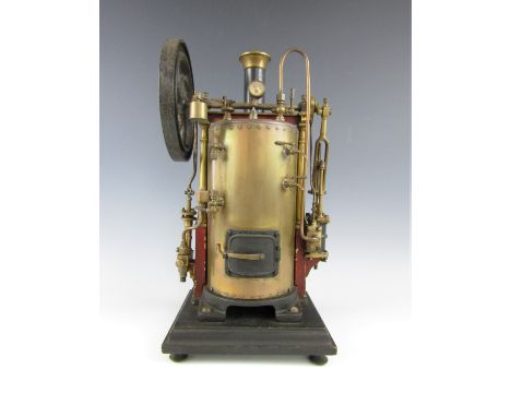 A late 19th Century live steam scale model stationary engine, having vertical boiler, single cylinder, water feed pump and ov