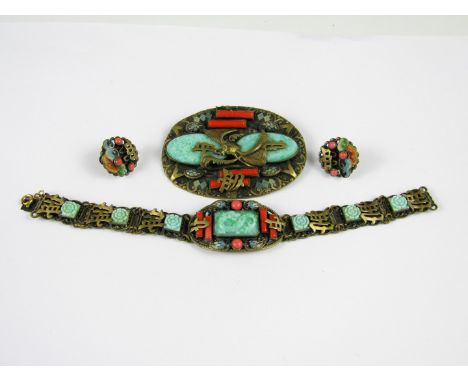A 1930s faux Chinese demi parure, comprising bracelet, brooch and earrings, decorated with glass cabochons and enamel work, o