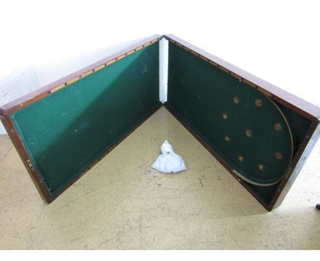 A Victorian mahogany folding bagatelle table