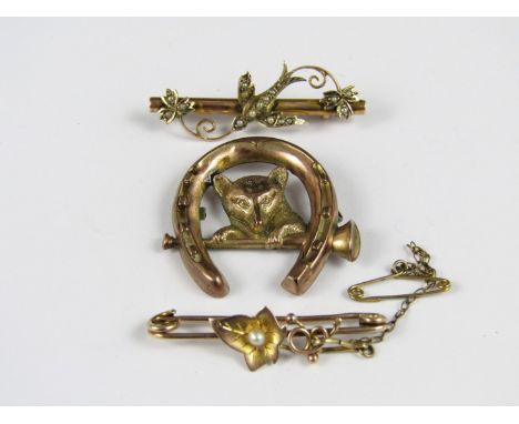 Two Victorian pearl-set 9ct gold bar brooches, and one other modelled as a fox, hunting horn and horseshoe, (latter a/f), 8.8