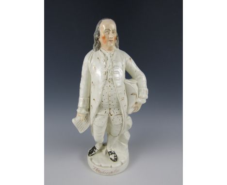 A Victorian Staffordshire portrait figurine of George Washington, actually modelled as Benjamin Franklin though identified as