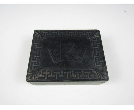 A Victorian Carton-pierre playing cards box, the slip lid having raised decoration in the form of a Greek key border surround