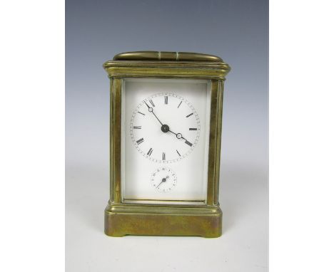 A late 19th / early 20th Century French carriage clock in corniche case