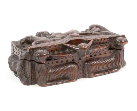 A Scottish 'blind man' deep carved mahogany snuff box, wooden hinge, the lid with Tam O' Shanter crossing a bridge on Maggie 