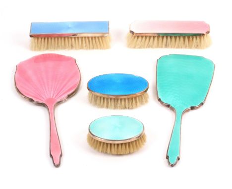 Silver and guilloche enamel dressing table accessories, comprising two hand mirrors and four brushes, one brush unmarked, lar