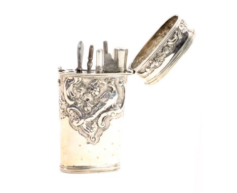 A late 18th Century silver travelling etui, unmarked, of oval section and tapering form richly decorated with repousse floral