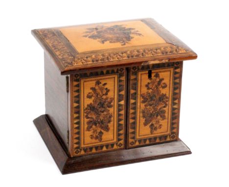 A Tunbridge ware rosewood table cabinet, on canted base, the front with a pair of floral mosaic doors within van dyke style b