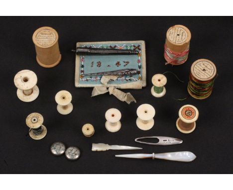 A mixed lot - sewing, comprising an engraved silver ribbon threader, Birmingham 1905, 5.2cms, a Bristol card bead work needle